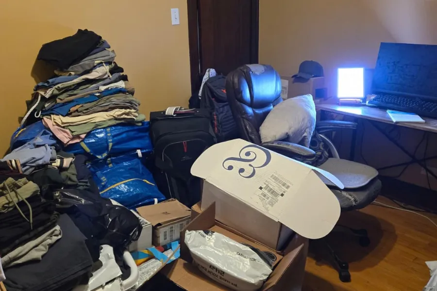 Household items and bags awaiting a room cleanout